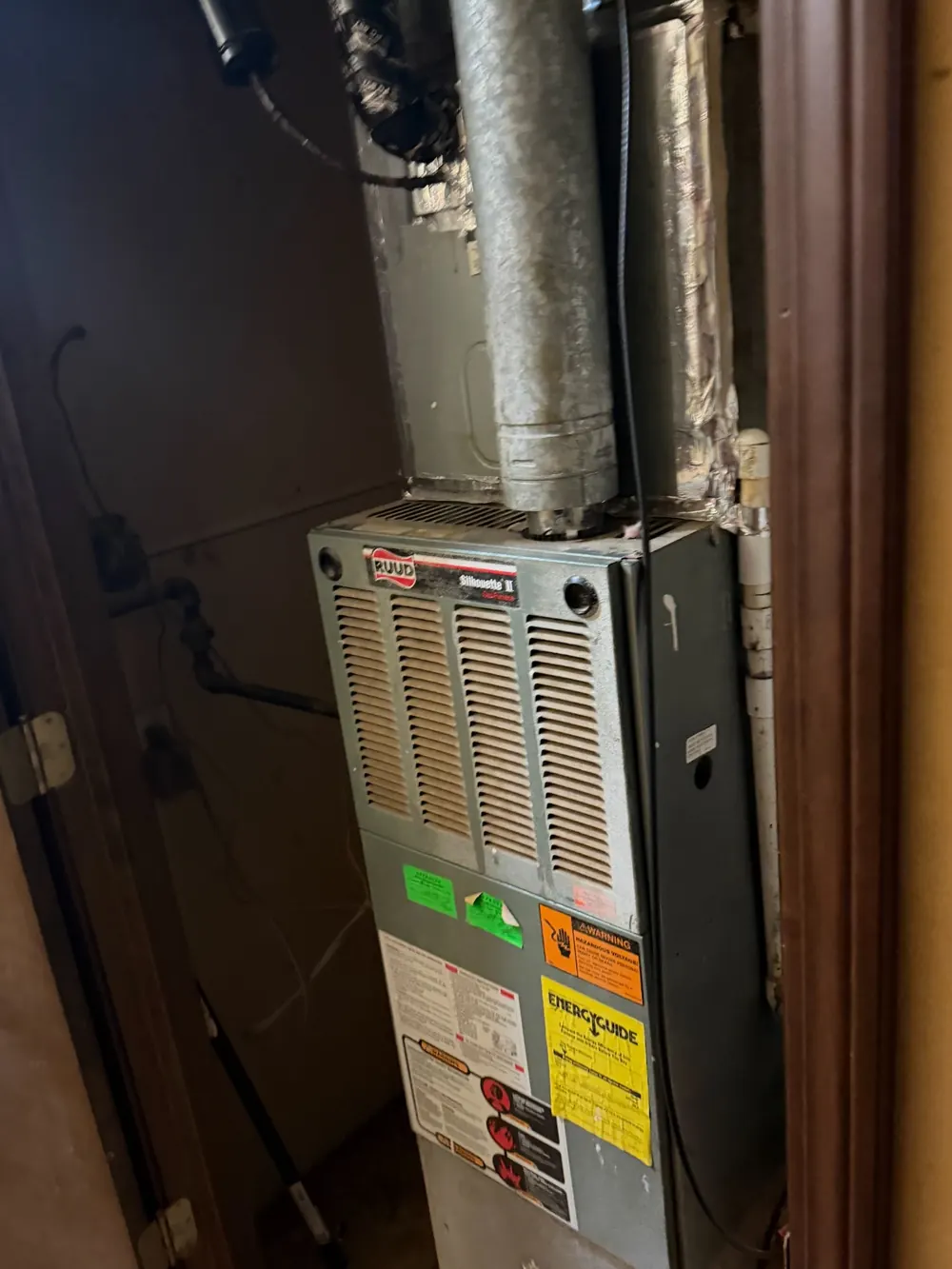 Older furnace before replacement by North Star Comfort