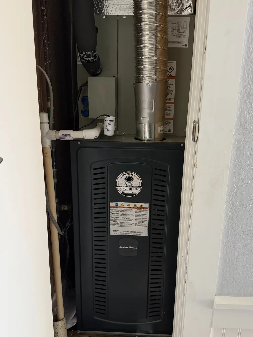 New American Standard furnace installation with North Star Comfort service branding
